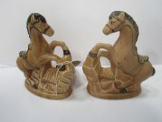 Pair of Sylvac stylised rearing horses. Estimate £15-25.