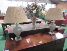 Pair of green table lamps. Estimate £20-30.