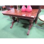 Victorian Rosewood display table on 2 heavy carved pedestal supports, 107cms x 71cms x 74cms.