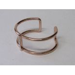 Fiorelli rose gold coloured double open bangle. Estimate £15-25