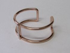 Fiorelli rose gold coloured double open bangle. Estimate £15-25