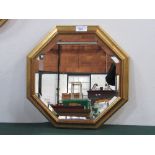 Hexagonal gilt framed bevel edge wall mirror. Estimate £20-30.