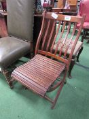 Folding steamer chair. Estimate £10-20.