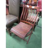 Folding steamer chair. Estimate £10-20.