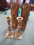 2x 1943 shell cases, 75mm & 2 brass candlesticks. Estimate £20-30.