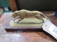 Brass greyhound on wooden plinth. Estimate £5-10.