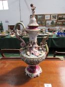 Highly ornate capodimonte ewer, height 74cms. Estimate £40-50.