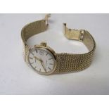 Longines lady's wristwatch in 9ct gold case & chain link strap, automatic date aperture, going