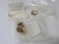 Fiorelli pearl type bracelet & gold coloured bracelet ring. Estimate £20-30.