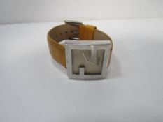 Authentic Fendi Orologi 4000L lady's square face watch with patent strap. Estimate £40-60.