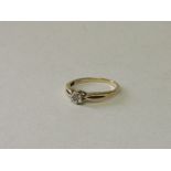 9ct gold solitaire ring, size N. Estimate £30-40.