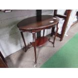 Mahogany oval display table with under shelf, 81cms x 52cms x 71cms. Estimate £20-30.