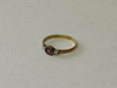 9ct gold amethyst ring, size O. Estimate £25-35.