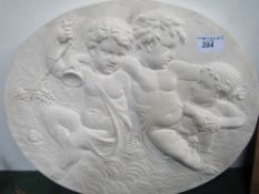 Plaster plaque depicting 3 cherubs, 70cms diameter. Estimate £20-30.