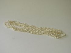 Natural pearl necklace, length 250cms. Estimate £25-35.