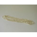 Natural pearl necklace, length 250cms. Estimate £25-35.