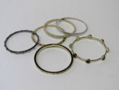 6 various Fiorelli bangles. Estimate £20-30.