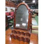 Walnut toilet mirror with 4 shaped drawers to base, mirror a/f. Estimate £30-50.