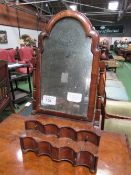 Walnut toilet mirror with 4 shaped drawers to base, mirror a/f. Estimate £30-50.