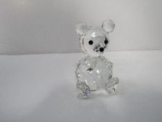 Large 7cms Swarovski crystal glass teddy bear. Estimate £20-30.