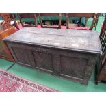 Oak chest with carved panels. Estimate £60-80.