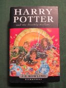 Harry Potter 1st edition, Harry Potter & the Deathly Hallows, with dust cover. Estimate £40-50.