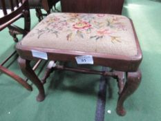 Early 19th century stool with stretcher on pad feet with tapestry drop-in seat. Estimate £10-20.