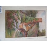 Framed & glazed watercolour of girl by a cottage entitled 'At Welford-on-Avon' signed Ethel