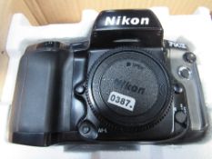 Nikon F90X camera body & Nikon FM2 camera body