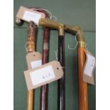 4 various walking sticks including 1 with 9ct gold ferrule, 1 with a drinking flask & 1 with a