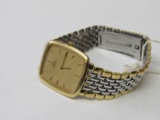 Omega DeVille wristwatch with metal strap. Estimate £80-100.