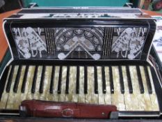 Alvari accordion in original case together with 2 music books. Estimate £40-60.