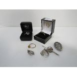 3 rings & a qty of silver items. Estimate £25-35.
