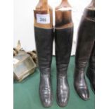 Pair of Edwardian black leather riding boots with Maxwell of Dover St. London wooden trees. Estimate