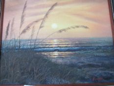 Framed oil on canvas of beach scene at sunset signed C Robertson. Estimate £10-20.
