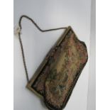 Late Victorian/Edwardian petite point evening bag. Estimate £50-80.