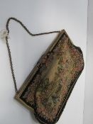 Late Victorian/Edwardian petite point evening bag. Estimate £50-80.