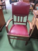 2 mahogany leather back open armchairs. Estimate £40-50.