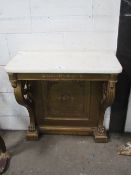 Marble top console table with gilt frame, carved scroll legs to claw feet & decorated back, 67cms