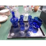 Blue glass star cut decanter & 6 glasses together with a blue vase on ebonised wooden tray with