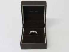 18ct white gold ring set with 5 diamonds, 0.99ct, size R, wt 3.9gms. Estimate £400-500.