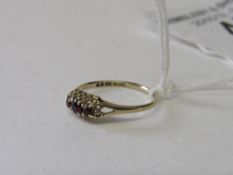 9ct gold & garnet ring, size N. Estimate £20-30.