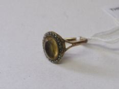 18ct gold (tested) topaz & seed pearl ring, size No. Estimate £60-70.