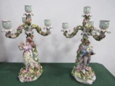 2 porcelain candelabra by Von Schierholz, 37cms height. Estimate £80-120.