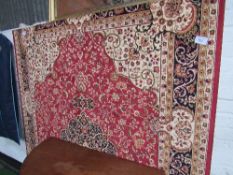 Red ground Keshan carpet, 2.8 x 2.0. Estimate £80-100.