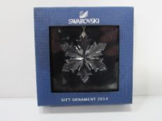 Swarovski crystal glass snowflake in box, 2014 boxed gift. Estimate £10-15.