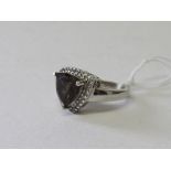 Hallmarked 925 silver ring with a brown triangular stone, size Q. Estimate £20-30.