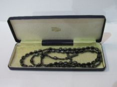 Impressive set of hematite rosary beads. Estimate £10-20.