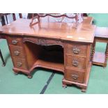 Mahogany dressing table on castors, 120cms x 61cms x 82cms. Estimate £40-60.