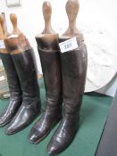 Pair of vintage black leather riding boots with period wooden trees. Estimate £30-50.